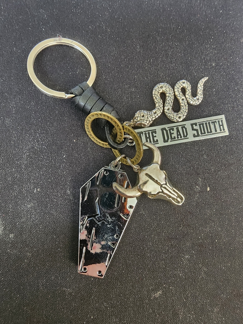 The Dead South Keychain with Snake & Bull Skull Charms - Black/Silver/Gold